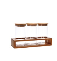 Set 3 barattoli in vetro borosilicato con coperchio e supporto in bamboo - diam. cm. 8 x h. cm. 15,5 / supporto: cm. 29 x 9,5 x h. cm. 6