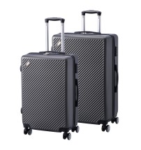 Set 2 trolley rigidi 4 ruote in ABS con chiusura TSA - 32 l. - 2,5 kg. - cm. 37 x 20 x h. cm. 56 / 60 l. - 3,1 kg. - cm. 43 x 25 x h. cm. 66 - grigi scuri